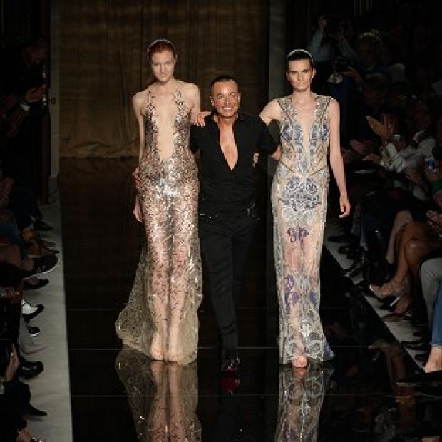 Julien Macdonald with models on the catwalk during his spring summer London Fashion Week show