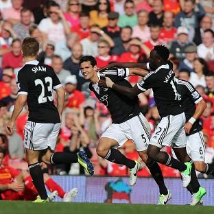 Congleton Guardian: Dejan Lovren, centre, celebrates scoring the only goal Congleton Guardian: Dejan Lovren, centre, celebrates scoring the only goal