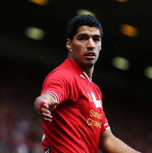 Congleton Guardian: Luis Suarez is set to return to action for Liverpool Congleton Guardian: Luis Suarez is set to return to action for Liverpool