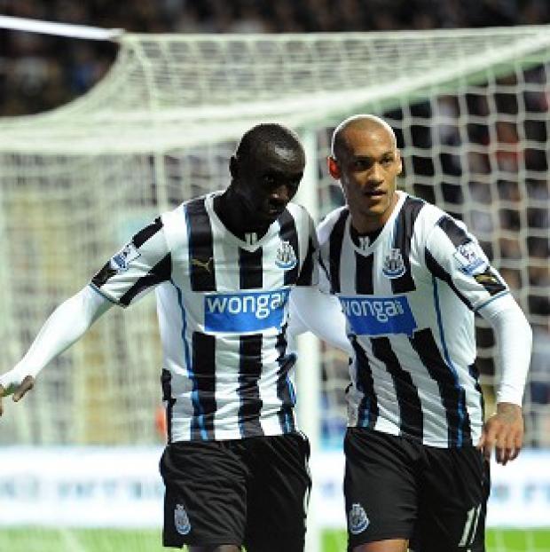 Papiss Cisse, left, celebrates his goal with team-mate Yoan Gouffran