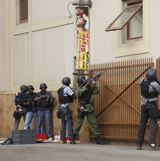 Armed special forces aim their weapons at the Westgate Mall in Nairobi, Kenya (AP/Khalil Senosi)