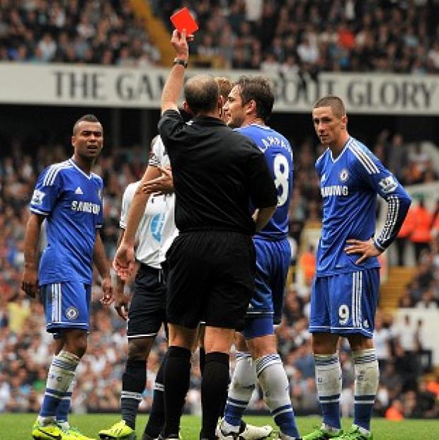 Fernando Torres, right, is sent off for an incident involving Jan Vertonghen