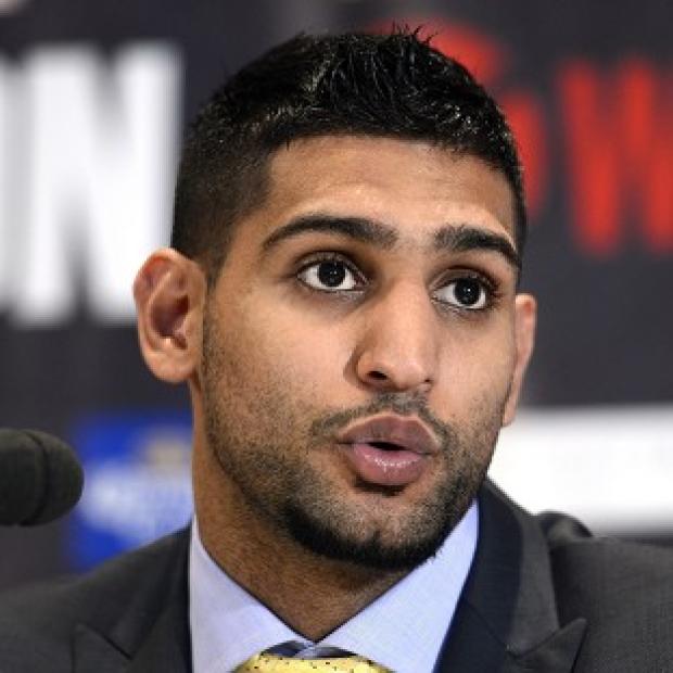 Amir Khan, pictured, has been linked with a big-money fight against Floyd Mayweather