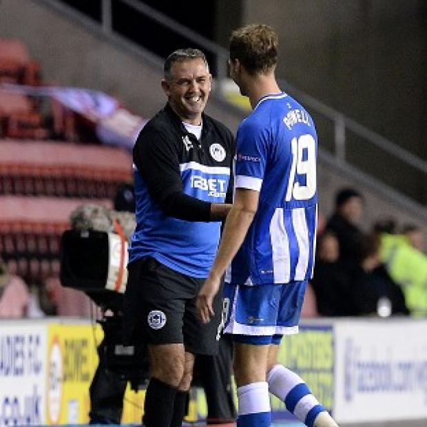 Congleton Guardian: Owen Coyle, left, congratulates Nick Powell after his two-goal outing Congleton Guardian: Owen Coyle, left, congratulates Nick Powell after his two-goal outing