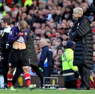 Congleton Guardian: Arsene Wenger, right, intends to remind Jack Wilshere of his responsibilties as an athlete Congleton Guardian: Arsene Wenger, right, intends to remind Jack Wilshere of his responsibilties as an athlete