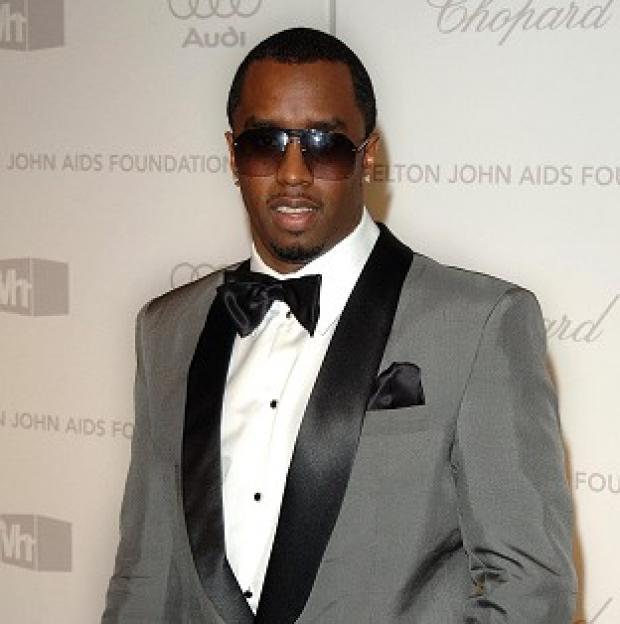 Sean 'P Diddy' Combs was a proud dad as his daughters took to the catwalk