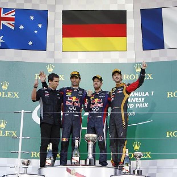 Sebastian Vettel, second right, is now on the cusp of becoming only the third driver in F1 to win a fourth consecutive world title (AP)