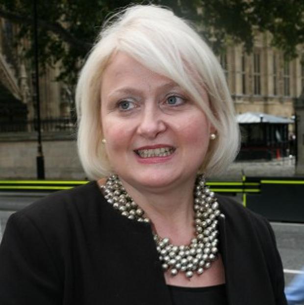 Journalist Nick Parker and a member of the public are facing charges linked to the theft of a mobile phone belonging to MP Siobhain McDonagh, pictured