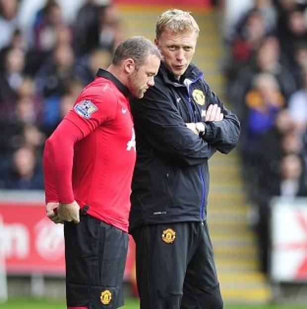 Congleton Guardian: Wayne Rooney, left, has been in scintillating form for club and country of late Congleton Guardian: Wayne Rooney, left, has been in scintillating form for club and country of late