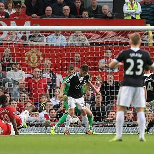 Robin van Persie's opener was cancelled out by Adam Lallana, centre, late on