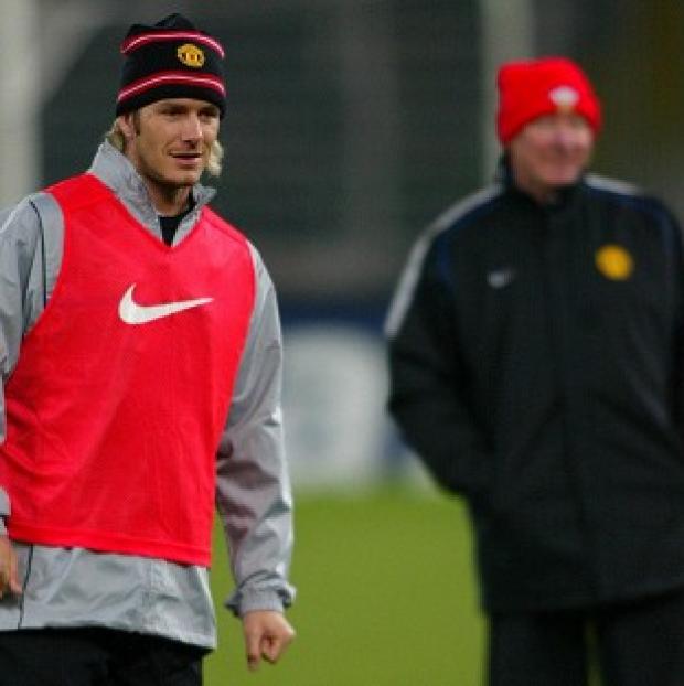 Sir Alex Ferguson, right, felt the time was right when David Beckham, left, moved to Real Madrid