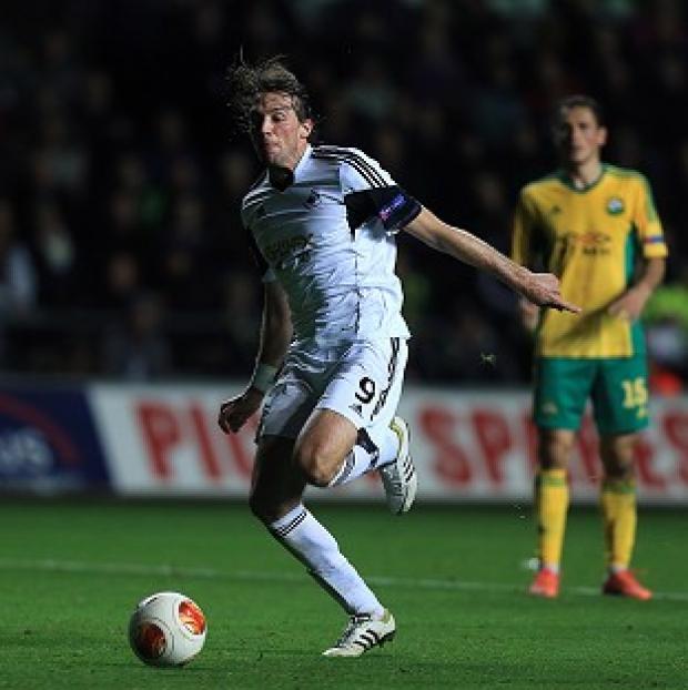 Michu fires Swansea into the lead