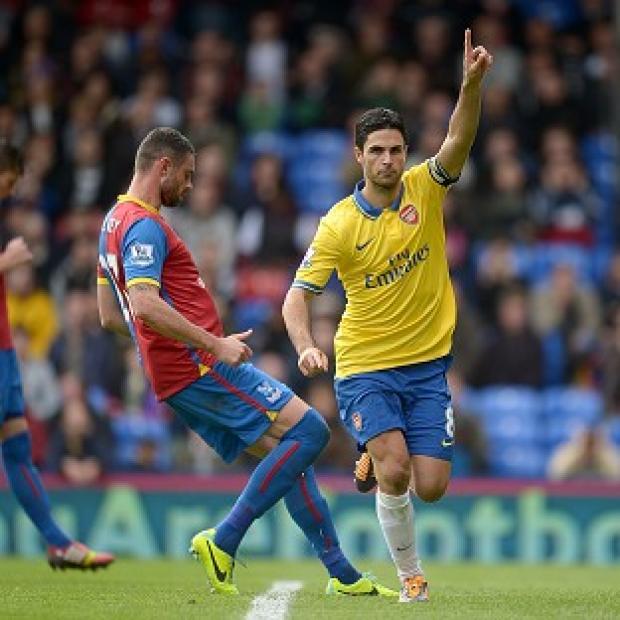 Congleton Guardian: Mikel Arteta, right, celebrates netting the opener from the penalty spot Congleton Guardian: Mikel Arteta, right, celebrates netting the opener from the penalty spot