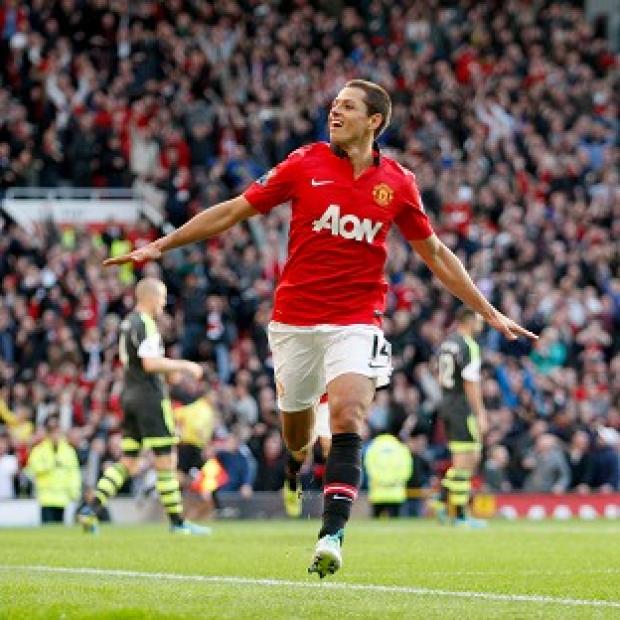 Javier Hernandez wheels away in delight after netting the winner against Stoke