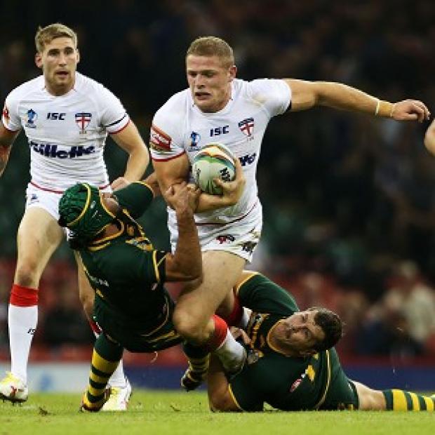 George Burgess, centre, is looking forward to running out at the John Smith's Stadium for the first time