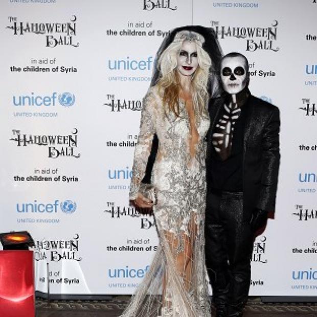 Julien Macdonald and fellow designer Melissa Odabash dressed up for the Unicef Halloween Ball