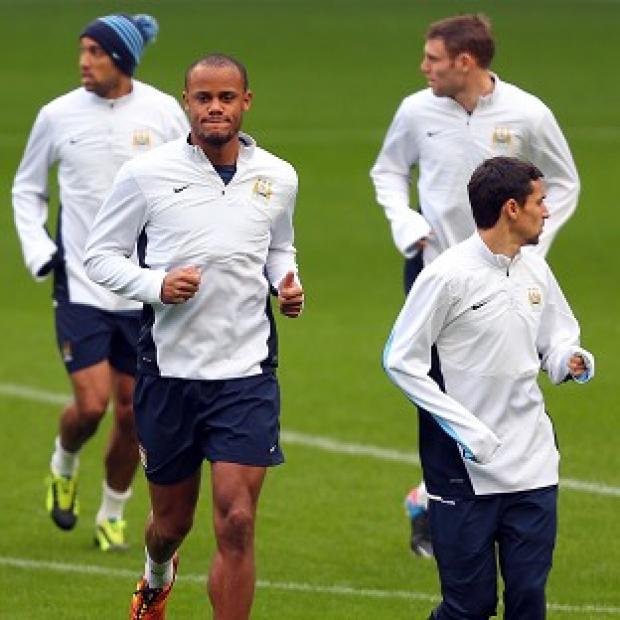 Congleton Guardian: Vincent Kompany, centre, is raring to go for Man City having returned to training following injury Congleton Guardian: Vincent Kompany, centre, is raring to go for Man City having returned to training following injury