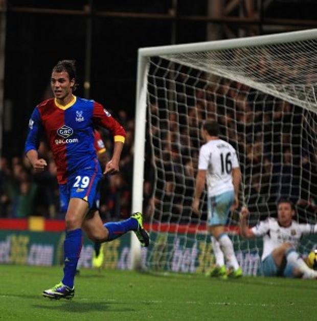 Congleton Guardian: Marouane Chamakh, 29, celebrates his goal against West Ham Congleton Guardian: Marouane Chamakh, 29, celebrates his goal against West Ham