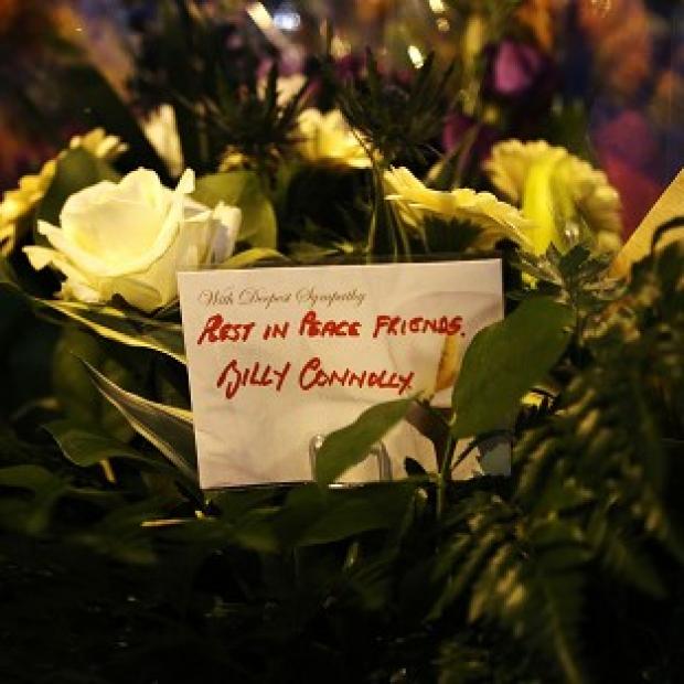 Congleton Guardian: Flowers left by comedian Billy Connolly near the Clutha bar helicopter crash scene in Glasgow. Congleton Guardian: Flowers left by comedian Billy Connolly near the Clutha bar helicopter crash scene in Glasgow.