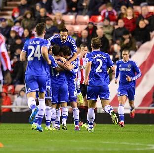 Congleton Guardian: Eden Hazard, obscured, is mobbed by team-mates after scoring Chelsea's second Congleton Guardian: Eden Hazard, obscured, is mobbed by team-mates after scoring Chelsea's second