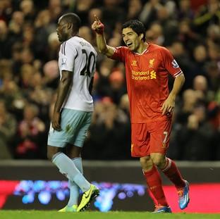 Congleton Guardian: Luis Suarez, right, was on fine form for Liverpool again Congleton Guardian: Luis Suarez, right, was on fine form for Liverpool again