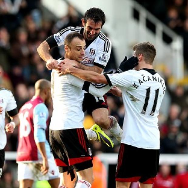Congleton Guardian: Dimitar Berbatov, centre, scored the second goal from the spot Congleton Guardian: Dimitar Berbatov, centre, scored the second goal from the spot
