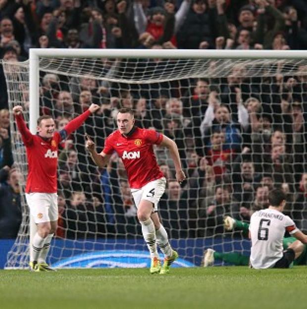 Congleton Guardian: Phil Jones, centre, celebrates scoring the winner against Shakhtar Donetsk Congleton Guardian: Phil Jones, centre, celebrates scoring the winner against Shakhtar Donetsk