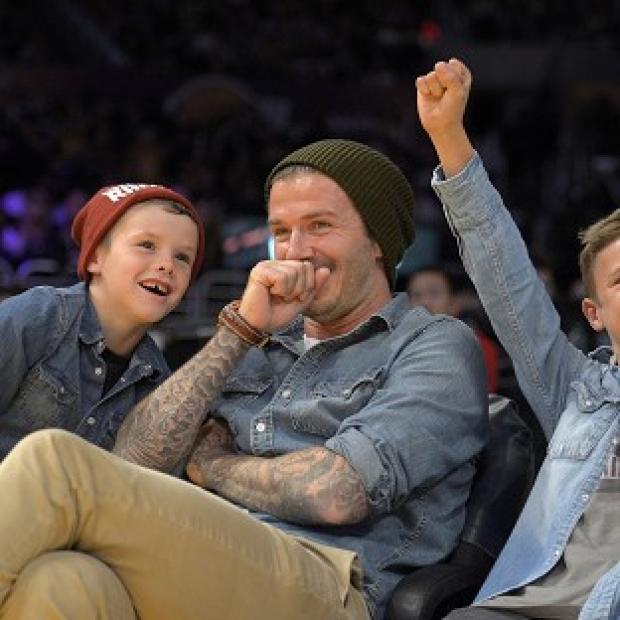Congleton Guardian: David Beckham pictured with his sons Romeo, right, and Cruz Congleton Guardian: David Beckham pictured with his sons Romeo, right, and Cruz