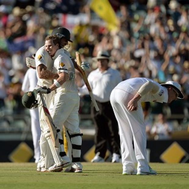 Congleton Guardian: Steve Smith, centre right, celebrates with Mitchell Johnson after reaching three figures in Perth Congleton Guardian: Steve Smith, centre right, celebrates with Mitchell Johnson after reaching three figures in Perth