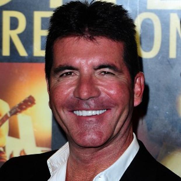 Congleton Guardian: Simon Cowell is the butt of many jokes in the new X Factor musical Congleton Guardian: Simon Cowell is the butt of many jokes in the new X Factor musical