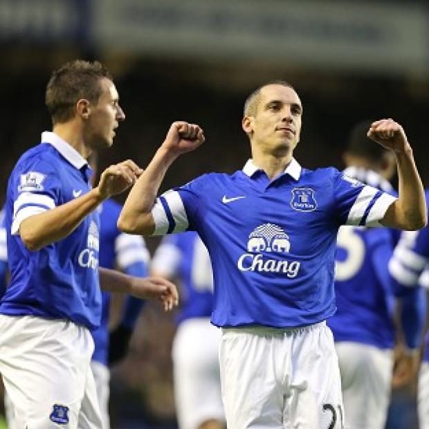Congleton Guardian: Leon Osman, right, scored Everton's opener against Fulham Congleton Guardian: Leon Osman, right, scored Everton's opener against Fulham