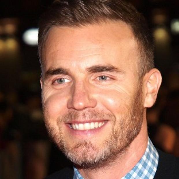 Congleton Guardian: Gary Barlow visited Afghanistan and sang with a band of military personnel for a TV show Congleton Guardian: Gary Barlow visited Afghanistan and sang with a band of military personnel for a TV show