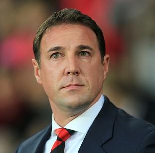 Congleton Guardian: Malky Mackay has stressed that he will not quit his job at Cardiff Congleton Guardian: Malky Mackay has stressed that he will not quit his job at Cardiff