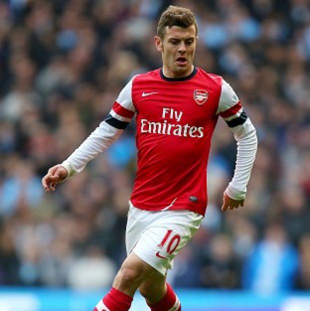 Congleton Guardian: Jack Wilshere will serve a two-match ban over an offensive gesture towards Manchester City fans Congleton Guardian: Jack Wilshere will serve a two-match ban over an offensive gesture towards Manchester City fans