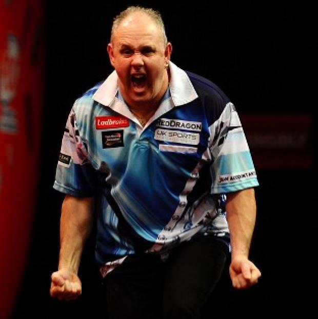 Congleton Guardian: Ian White celebrates beating Kim Huybrechts at Alexandra Palace Congleton Guardian: Ian White celebrates beating Kim Huybrechts at Alexandra Palace