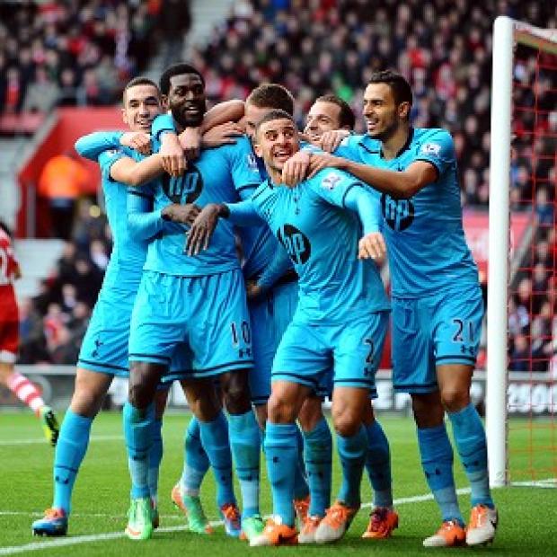 Congleton Guardian: Emmanuel Adebayor, second left, celebrates scoring the winning goal Congleton Guardian: Emmanuel Adebayor, second left, celebrates scoring the winning goal