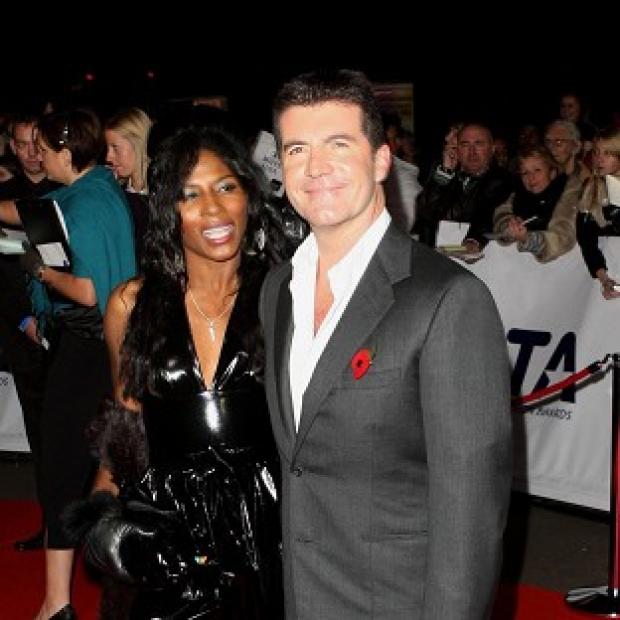 Congleton Guardian: Simon Cowell and close pal Sinitta Congleton Guardian: Simon Cowell and close pal Sinitta