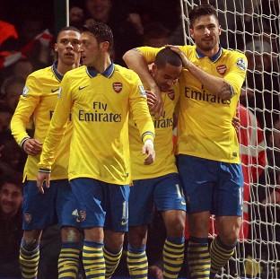 Congleton Guardian: Theo Walcott, centre, scored twice for Arsenal at Upton Park Congleton Guardian: Theo Walcott, centre, scored twice for Arsenal at Upton Park
