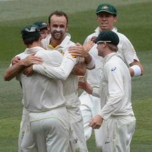 Congleton Guardian: Nathan Lyon, second from left, finished with five for 50 Congleton Guardian: Nathan Lyon, second from left, finished with five for 50