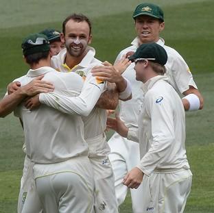 Congleton Guardian: Nathan Lyon, second from left, finished with five for 50 Congleton Guardian: Nathan Lyon, second from left, finished with five for 50