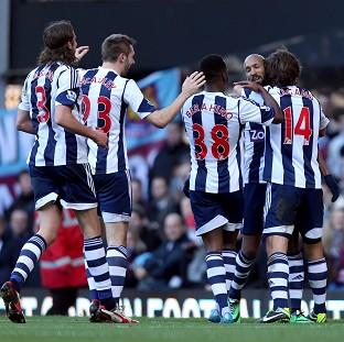 Congleton Guardian: Nicolas Anelka, second right, is mobbed after scoring West Brom's second goal Congleton Guardian: Nicolas Anelka, second right, is mobbed after scoring West Brom's second goal