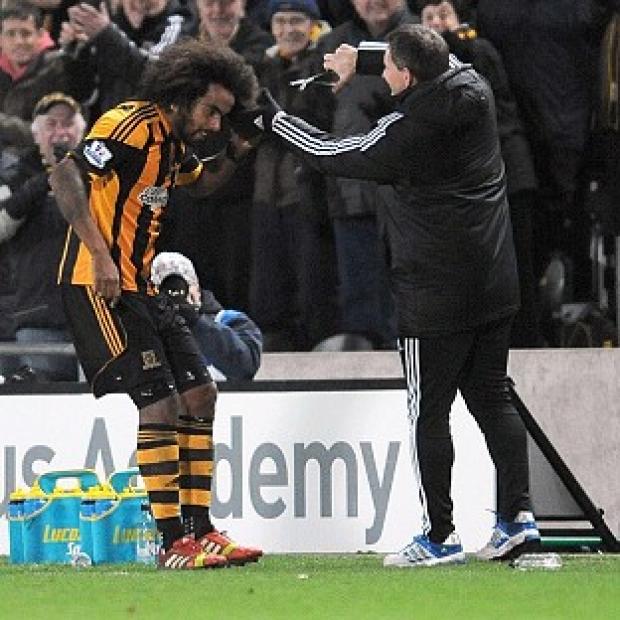 Congleton Guardian: Tom Huddlestone, left, celebrates his first goal for Hull Congleton Guardian: Tom Huddlestone, left, celebrates his first goal for Hull