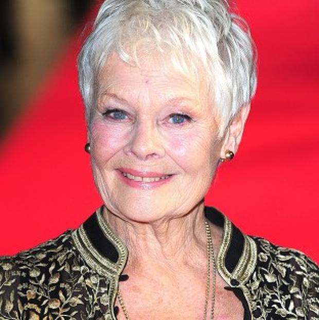 Congleton Guardian: Dame Judi Dench has recalled flashing her bottom at Harvey Weistein in a Hollywood restaurant Congleton Guardian: Dame Judi Dench has recalled flashing her bottom at Harvey Weistein in a Hollywood restaurant