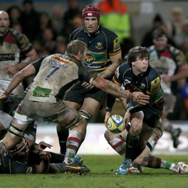 Congleton Guardian: Lee Dickson is tackled by Harlequins' Chris Robshaw at Franklin's Gardens Congleton Guardian: Lee Dickson is tackled by Harlequins' Chris Robshaw at Franklin's Gardens
