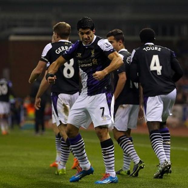 Congleton Guardian: Luis Suarez, centre, scored twice in Liverpool's win Congleton Guardian: Luis Suarez, centre, scored twice in Liverpool's win