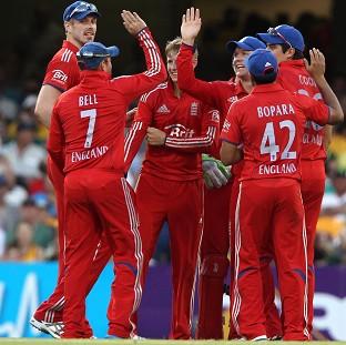 Congleton Guardian: England players celebrate the wicket of Australia's Michael Clarke during the second ODI at the Gabba (AP) Congleton Guardian: England players celebrate the wicket of Australia's Michael Clarke during the second ODI at the Gabba (AP)