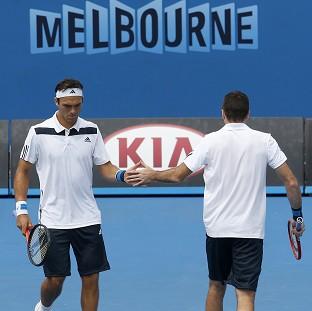 Congleton Guardian: Ross Hutchins and Colin Fleming during their second round doubles match at the Australian Open tennis championship in Melbourne (AP) Congleton Guardian: Ross Hutchins and Colin Fleming during their second round doubles match at the Australian Open tennis championship in Melbourne (AP)