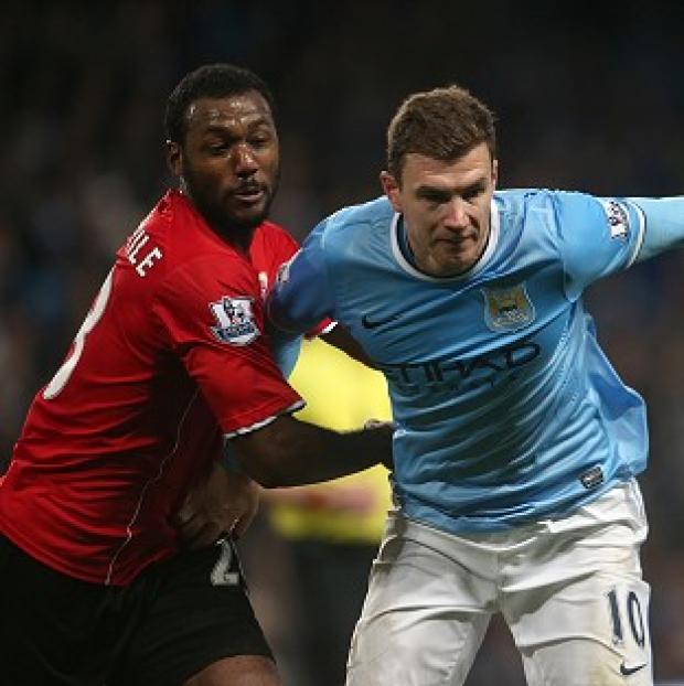 Congleton Guardian: Edin Dzeko, right, wants to win trophies at Manchester City Congleton Guardian: Edin Dzeko, right, wants to win trophies at Manchester City