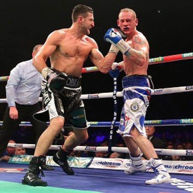 Congleton Guardian: Carl Froch, left, beat George Groves, right, in their controversial bout in November Congleton Guardian: Carl Froch, left, beat George Groves, right, in their controversial bout in November