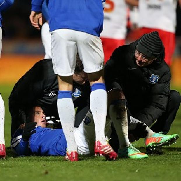 Congleton Guardian: Bryan Oviedo lies injured after the tackle Congleton Guardian: Bryan Oviedo lies injured after the tackle